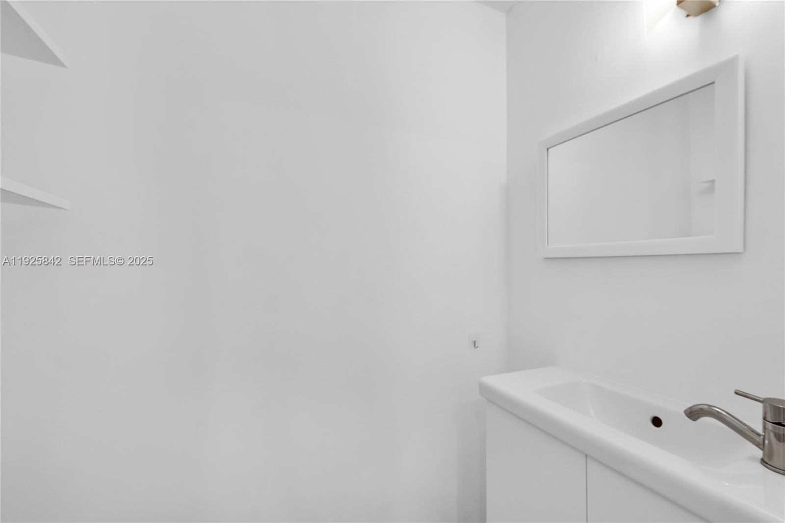 1350 Pennsylvania Avenue, Unit 207 Miami Beach, FL 33139 - Photo 21 of 47 Half-Bathroom