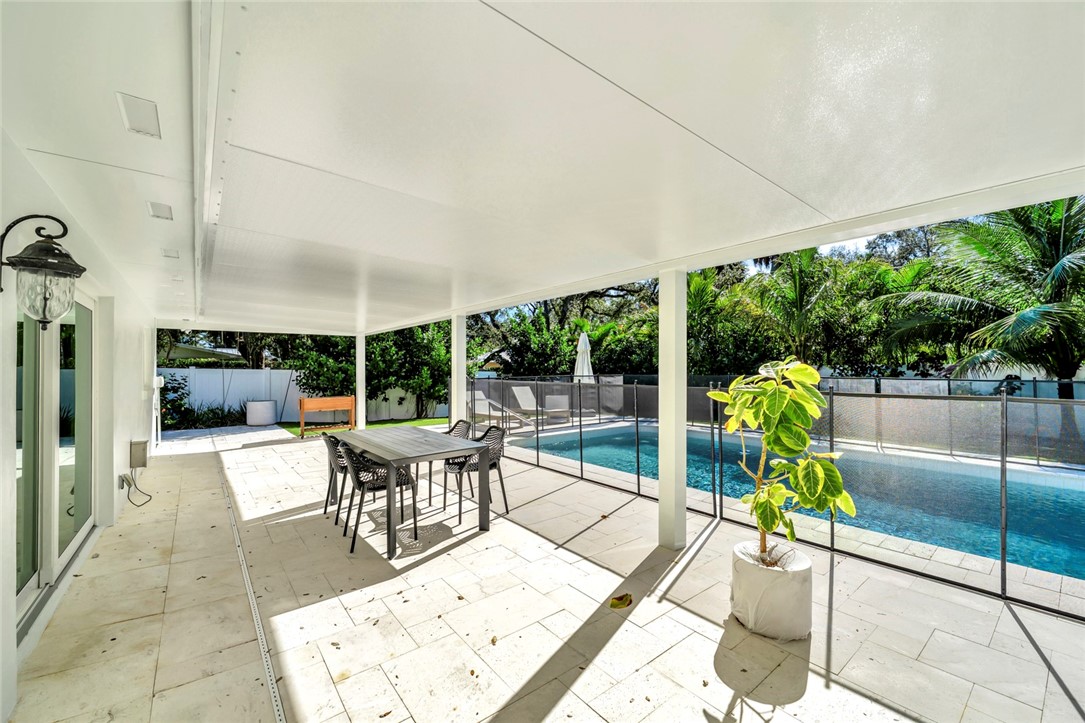 406 Indian Lilac Road Vero Beach, FL 32963 - Photo 15 of 36 a outdoor space with furniture