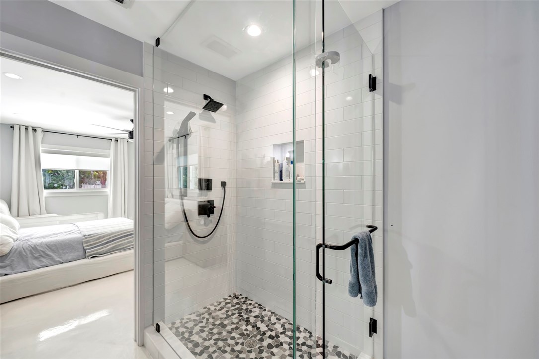 406 Indian Lilac Road Vero Beach, FL 32963 - Photo 22 of 36 a bathroom with a shower