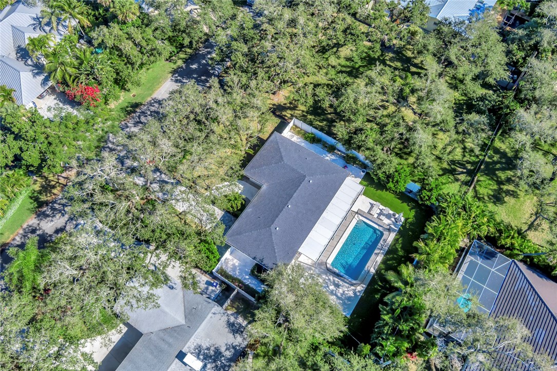 406 Indian Lilac Road Vero Beach, FL 32963 - Photo 36 of 36 an aerial view of house with yard