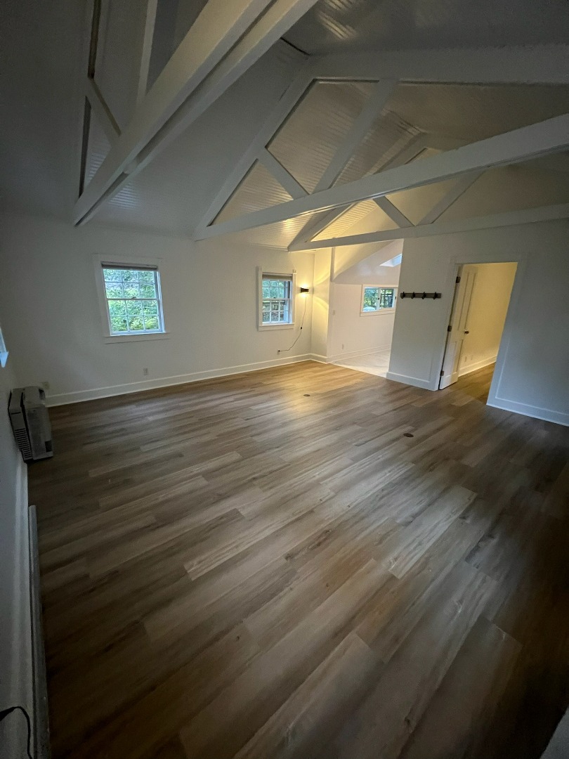 260 The Boulevard Edgartown, MA 02539 - Photo 3 of 8 a view of an empty room with window and wooden floor