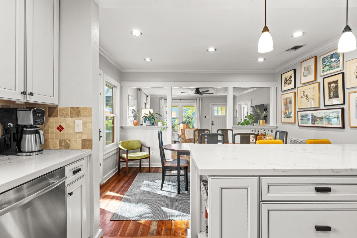 805 Ralfallen Street Houston, TX 77008 - Photo 11 of 32 a living room with stainless steel appliances kitchen island granite countertop furniture and a kitchen view