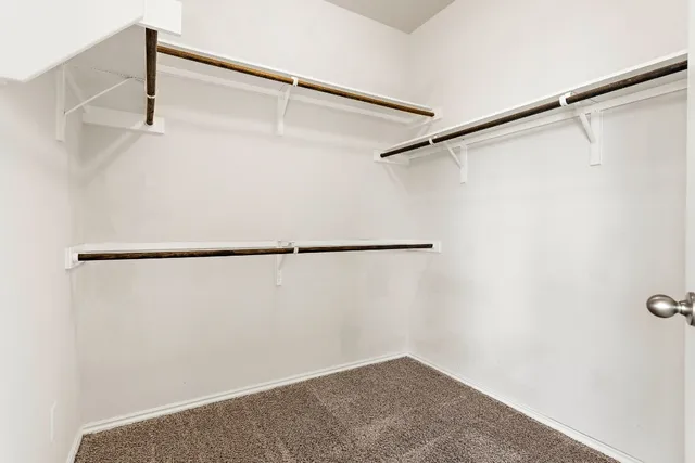 a bathroom with a sink vanity and a mirror