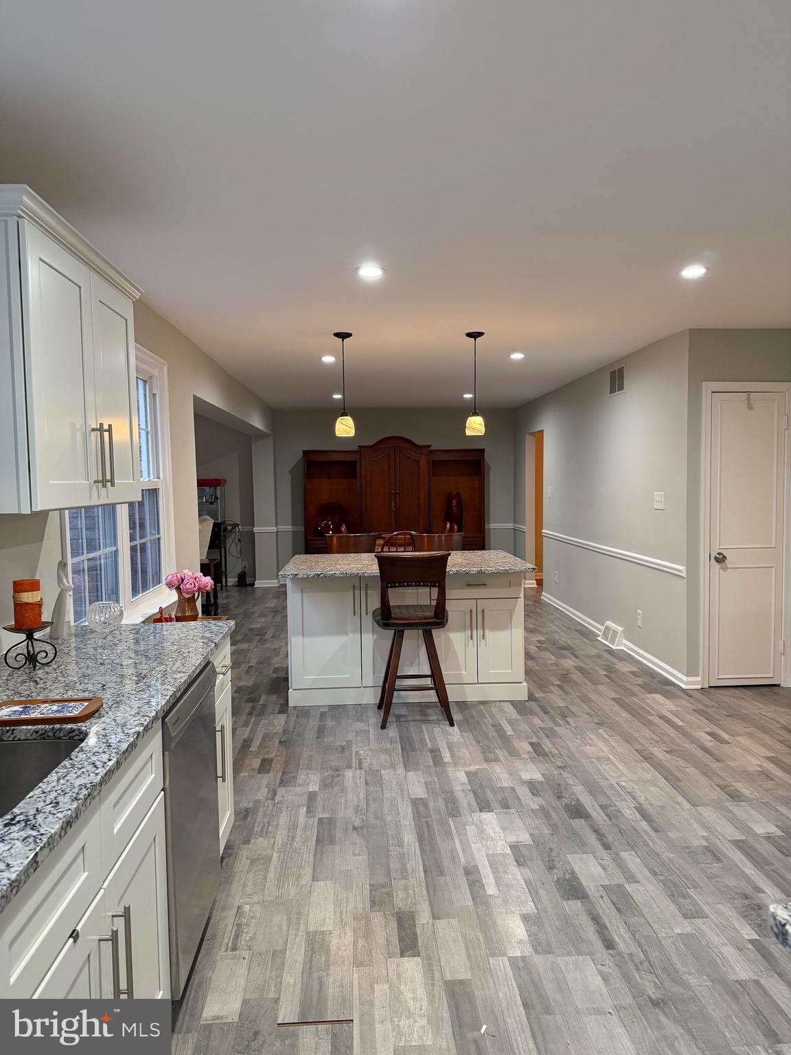 78 Kansas Road Pennsville, NJ 08070 - Photo 7 of 24 a large kitchen with stainless steel appliances kitchen island granite countertop a sink and cabinets