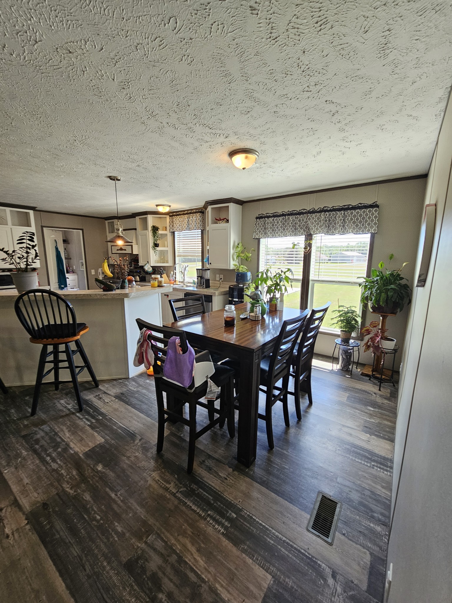 1824 Austin Road Lafayette, TN 37083 - Photo 14 of 35 a view of a dining room with furniture and wooden floor