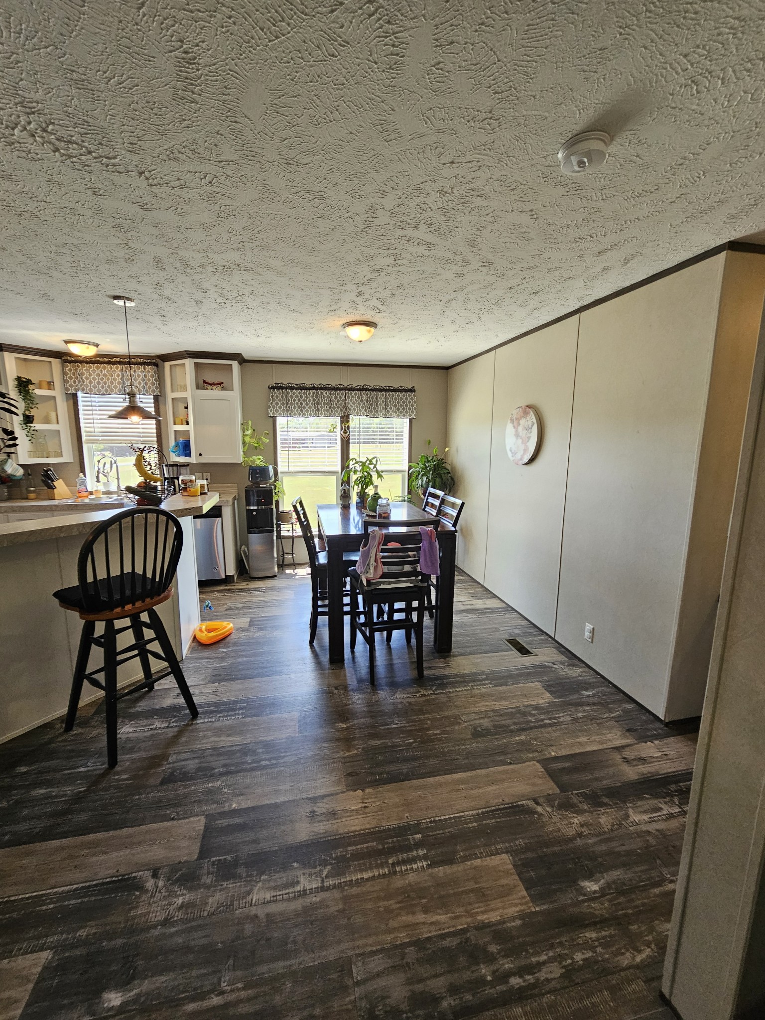 1824 Austin Road Lafayette, TN 37083 - Photo 15 of 35 a living room with dining room and wooden floor