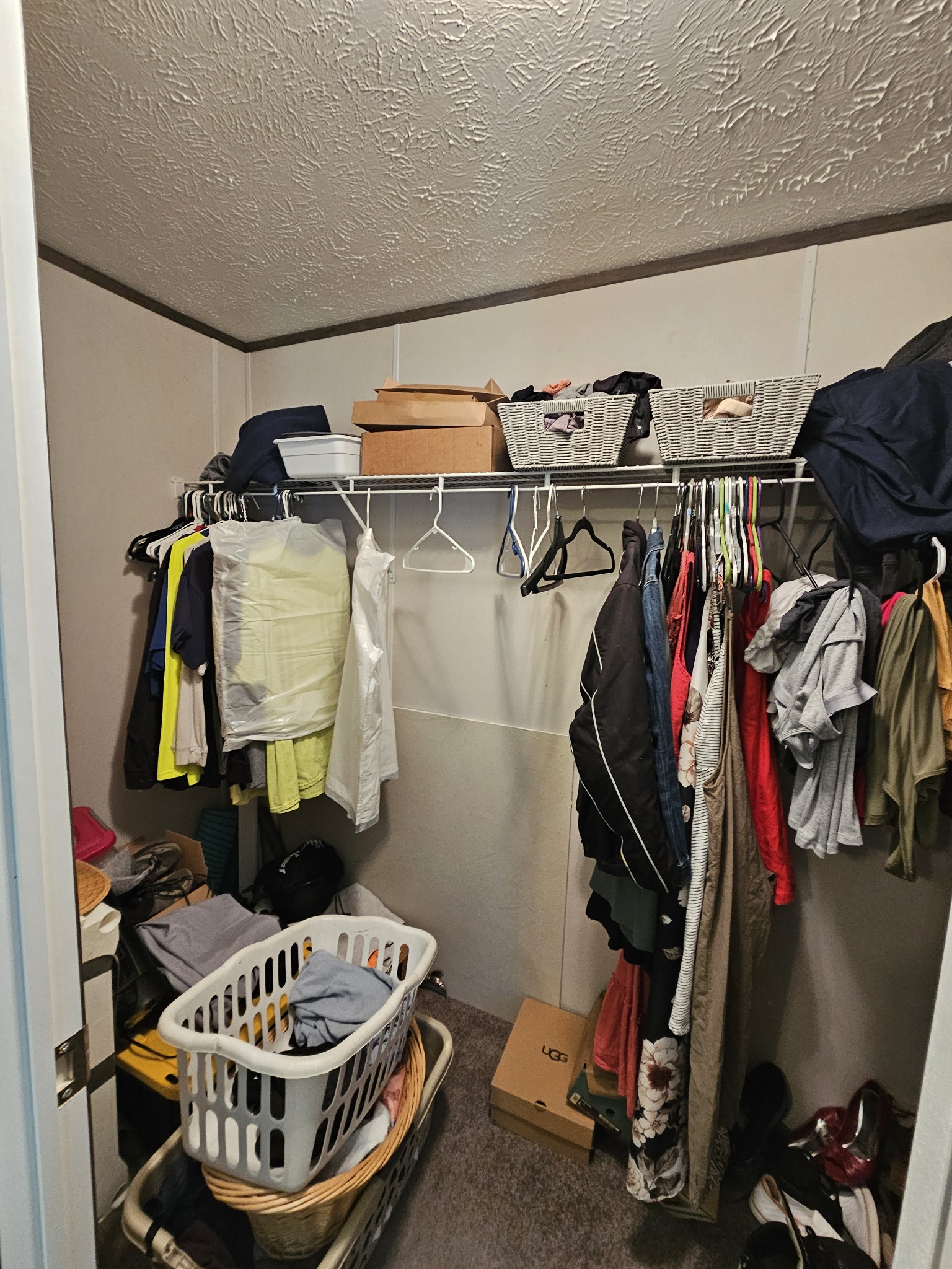 1824 Austin Road Lafayette, TN 37083 - Photo 23 of 35 a view of walk in closet with clothes and shoes