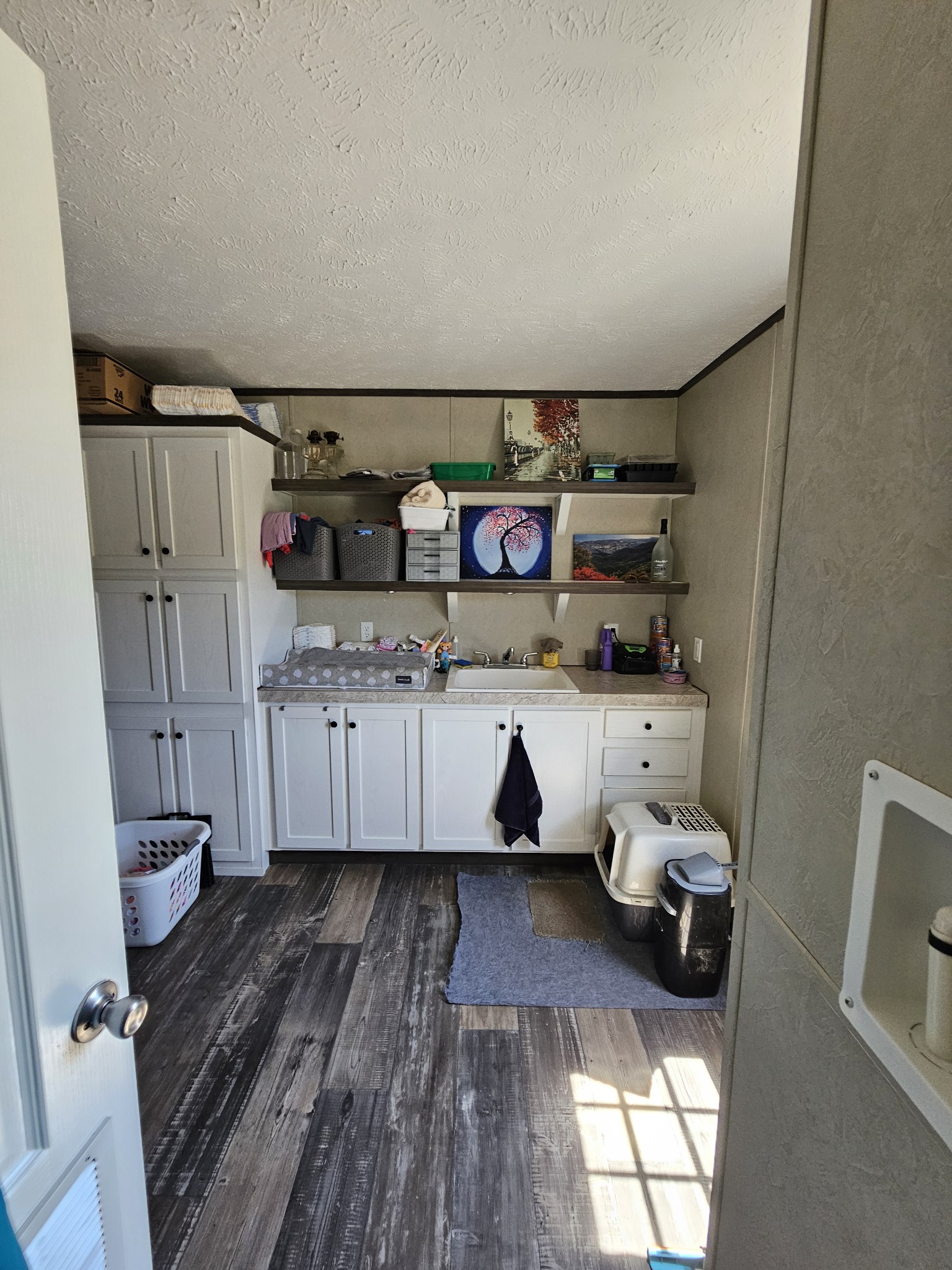 1824 Austin Road Lafayette, TN 37083 - Photo 30 of 35 a kitchen with stainless steel appliances a stove a sink and a refrigerator