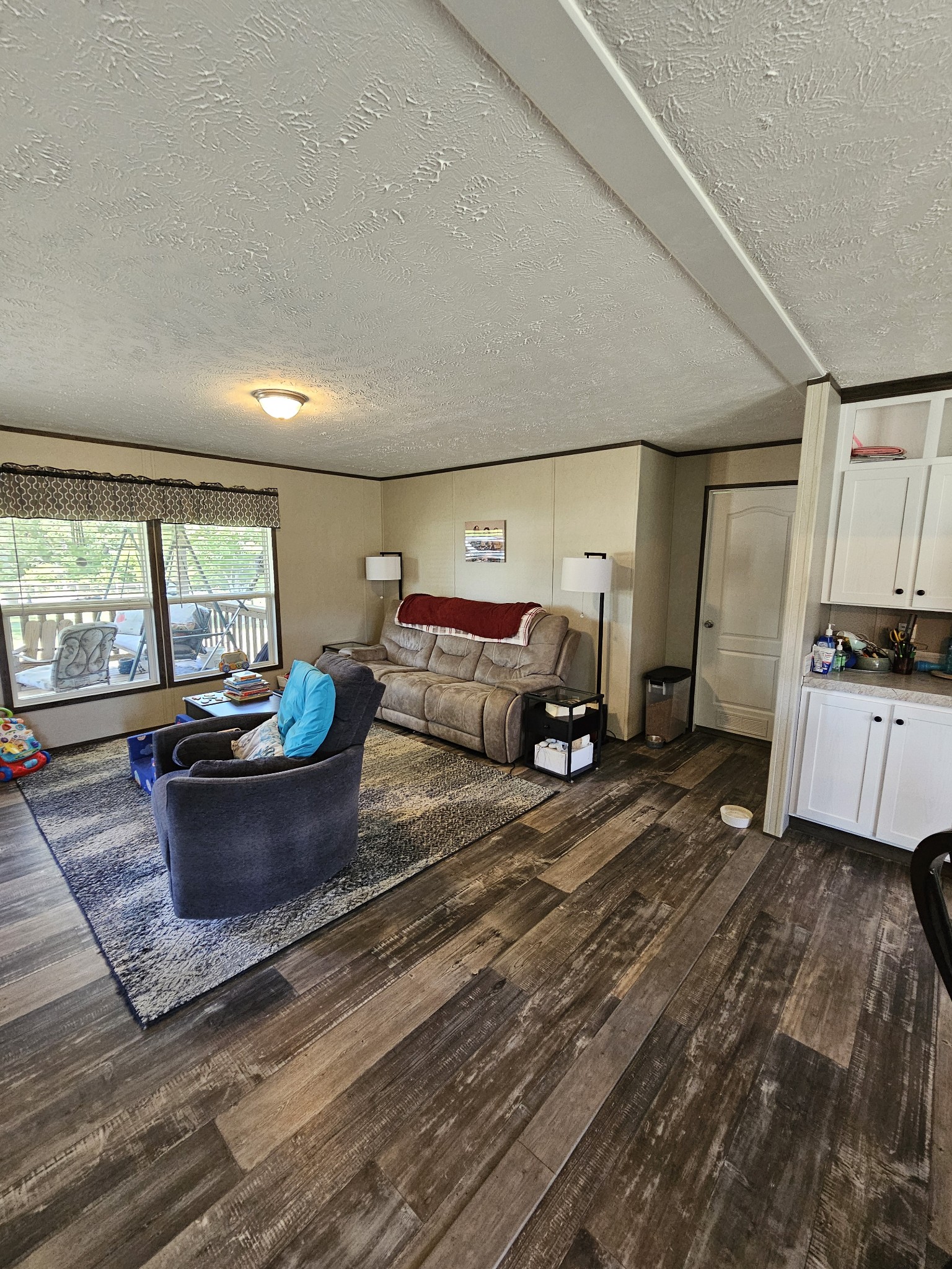 1824 Austin Road Lafayette, TN 37083 - Photo 8 of 35 a living room with furniture and a large window
