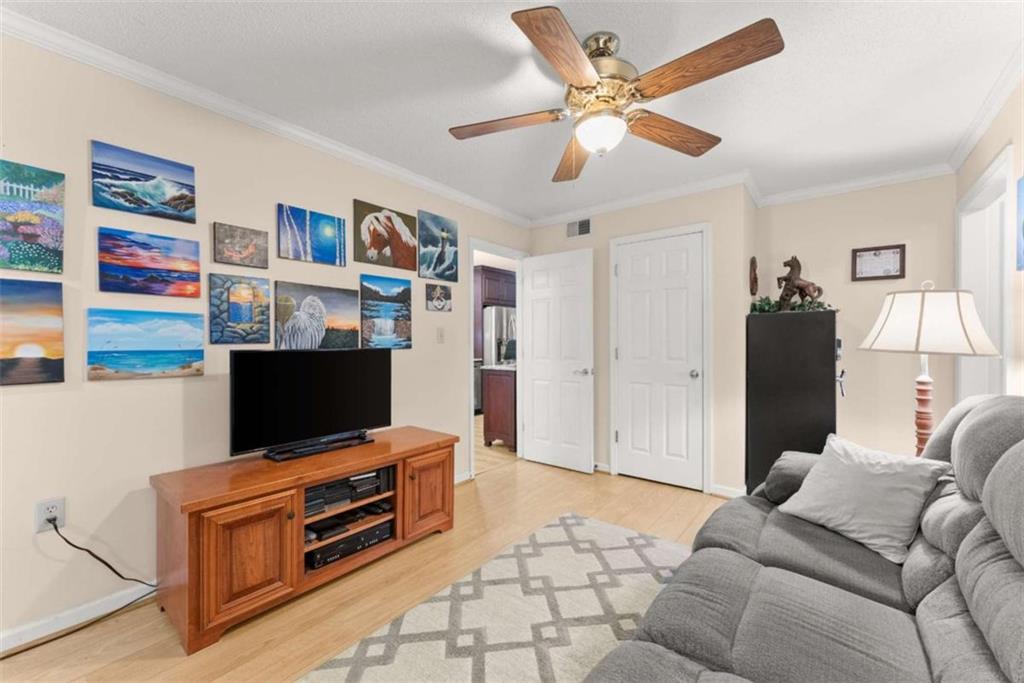 3322 Cheek Pulliam Road Royston, GA 30662 - Photo 14 of 61 a living room with furniture and a flat screen tv