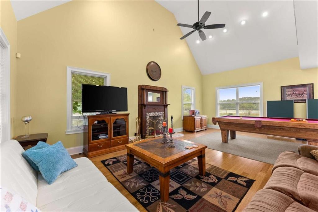 3322 Cheek Pulliam Road Royston, GA 30662 - Photo 29 of 61 a living room with furniture and a flat screen tv