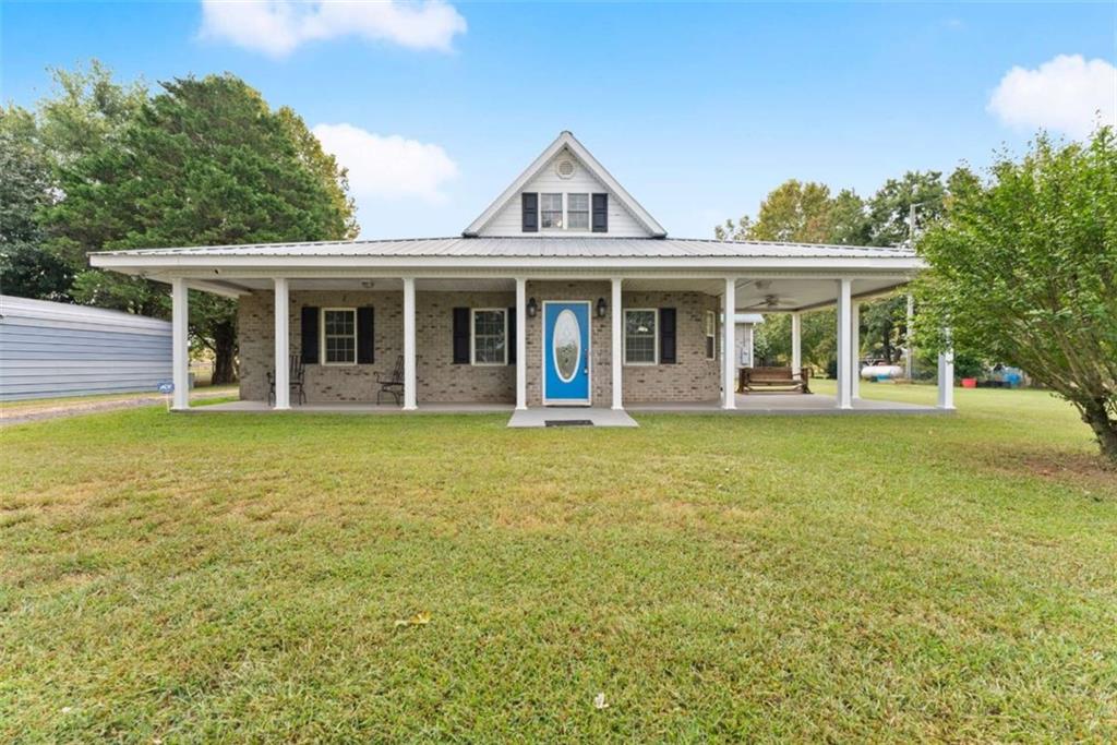 3322 Cheek Pulliam Road Royston, GA 30662 - Photo 3 of 61 a front view of a house with garden