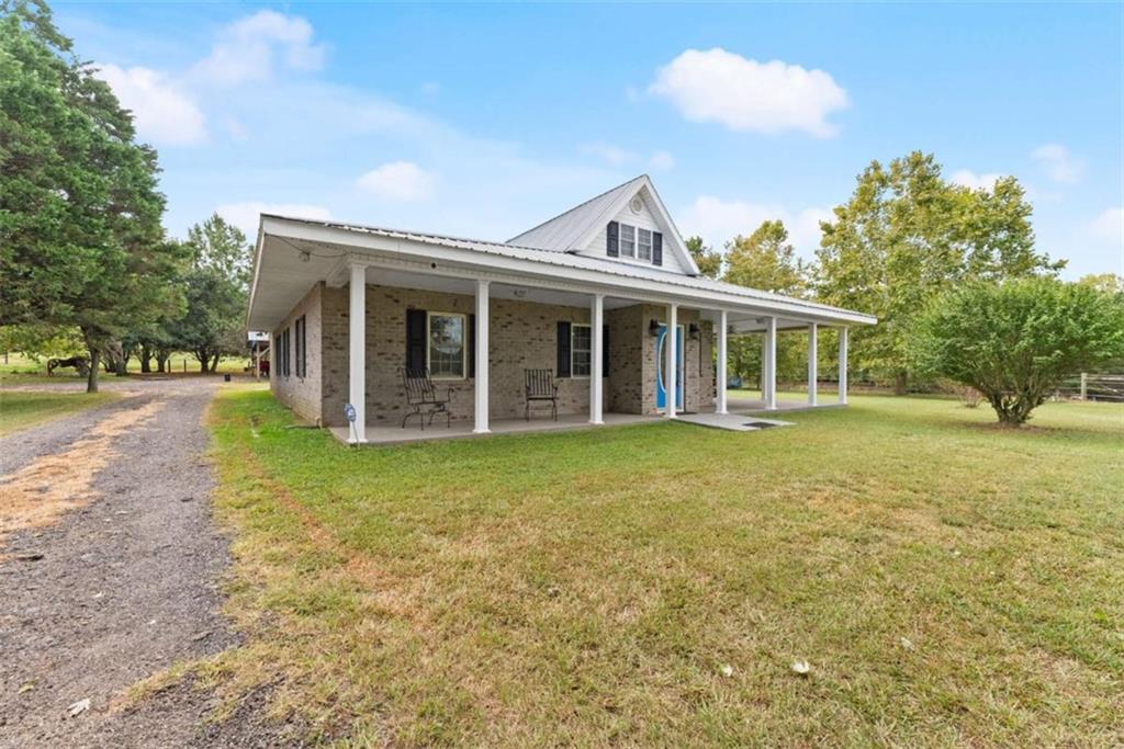 3322 Cheek Pulliam Road Royston, GA 30662 - Photo 4 of 61 a view of a house with a garden