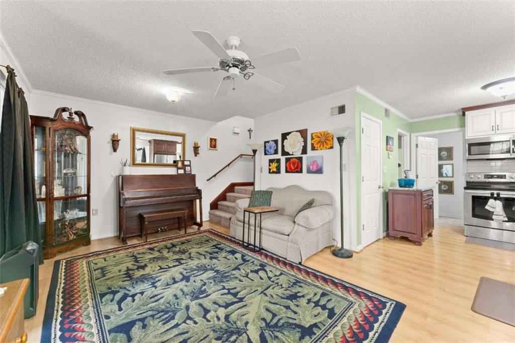 3322 Cheek Pulliam Road Royston, GA 30662 - Photo 7 of 61 a living room with furniture and a rug
