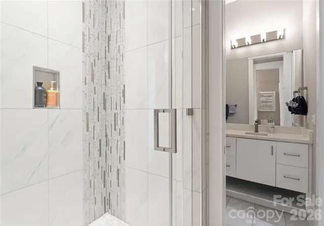 a living room with furniture fireplace and flat screen tv