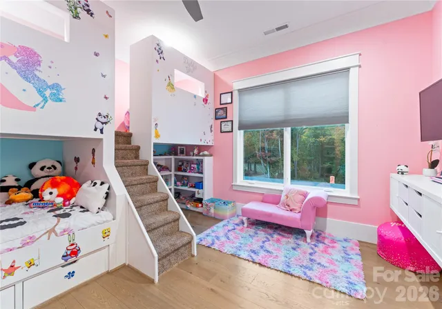 an aerial view of a house with a garden