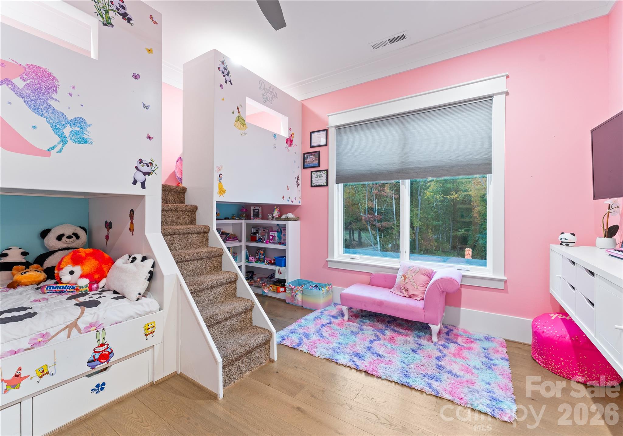 15700 Youngblood Road Charlotte, NC 28278 - Photo 26 of 41 a bedroom with baby toys and flat screen tv