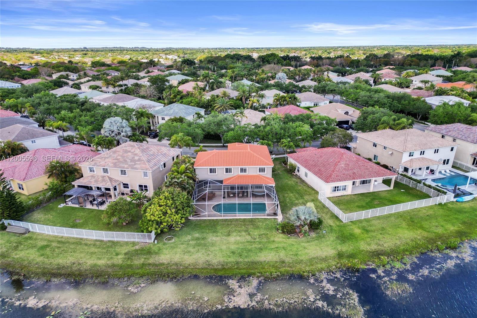 4281 Laurel Ridge Circle Weston, FL 33331 - Photo 76 of 80 an aerial view of residential houses with outdoor space