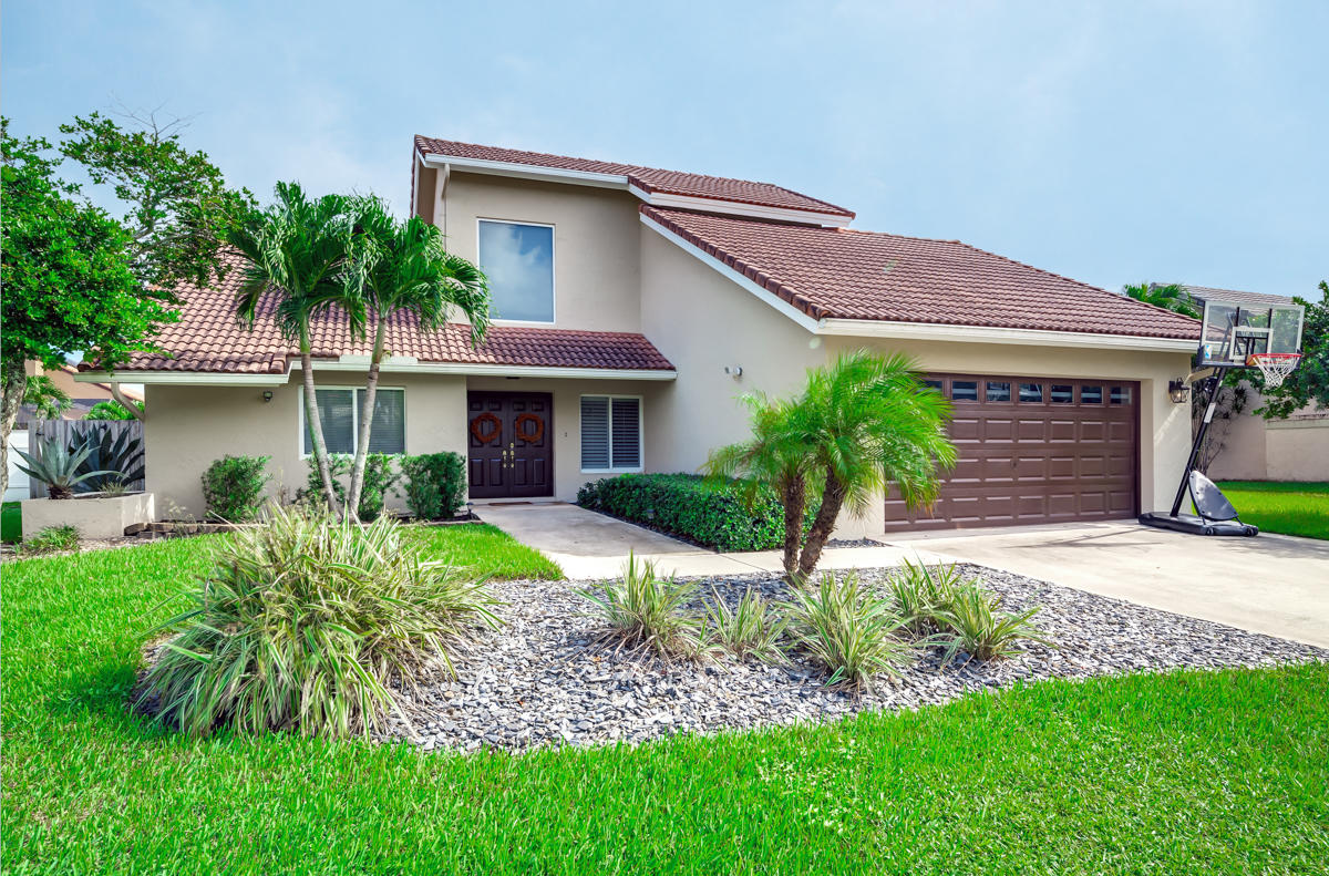 22340 Martella Avenue Boca Raton, FL 33433 - Photo 1 of 26 Front