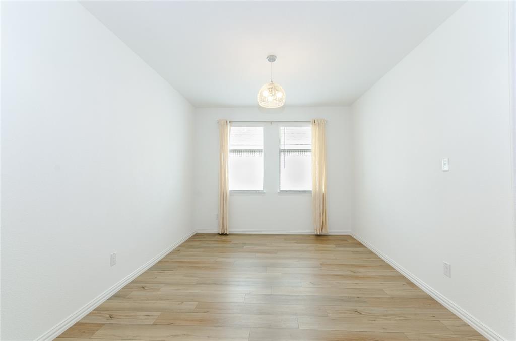 1222 Sequoia Lane Princeton, TX 75407 - Photo 18 of 29 Dining room with light wood finished floors and baseboards