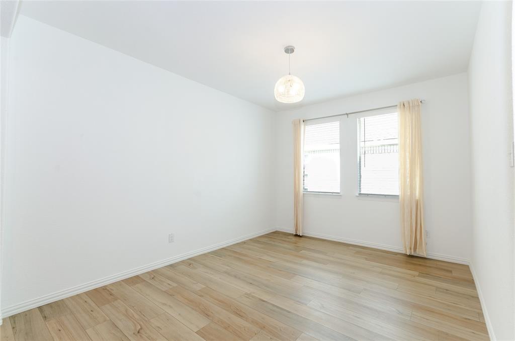1222 Sequoia Lane Princeton, TX 75407 - Photo 19 of 29 Dining room featuring light wood-style floors and baseboards