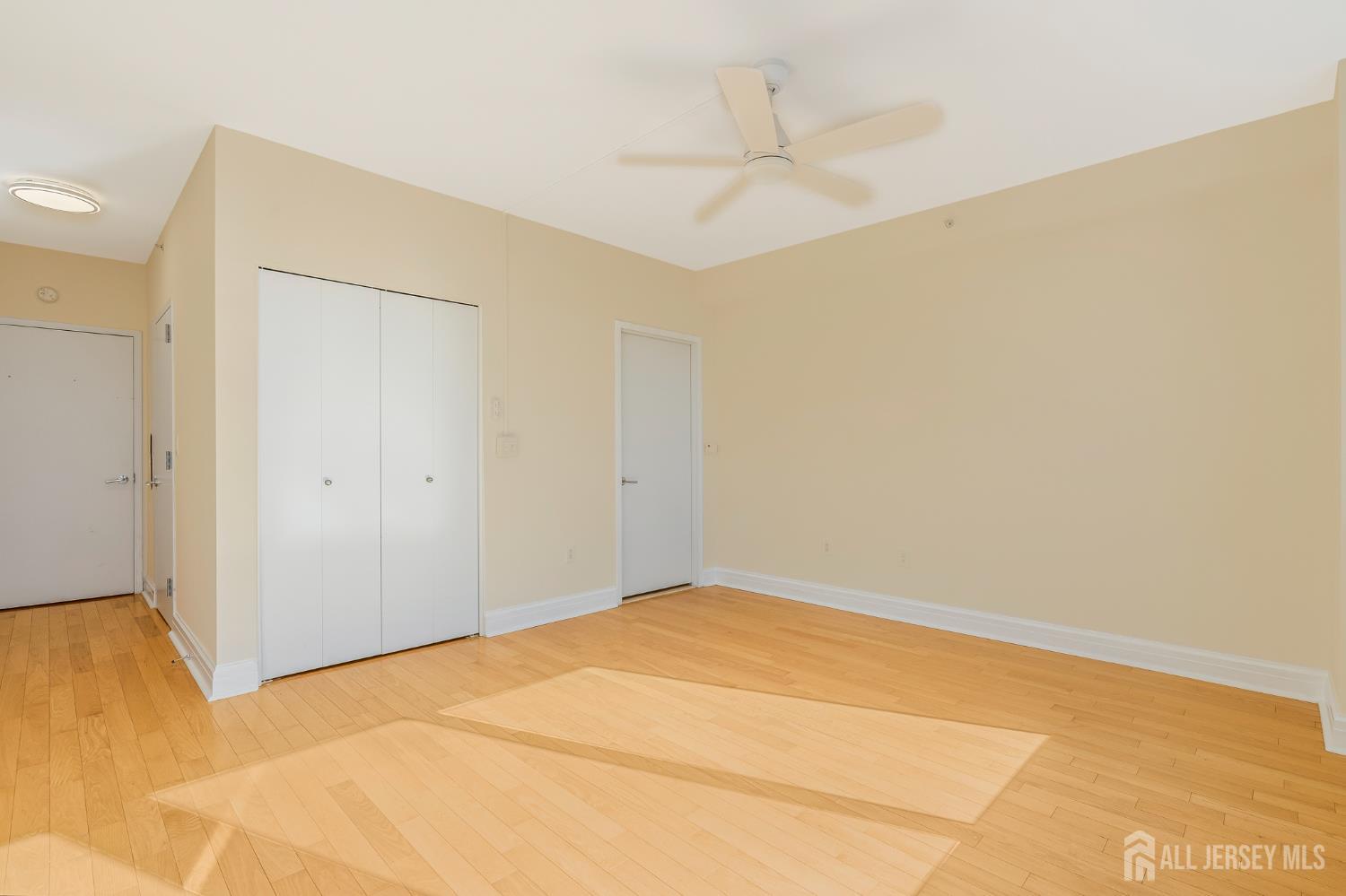 1 Spring Street, Unit 1704 New Brunswick, NJ 08901 - Photo 17 of 44 a view of an empty room