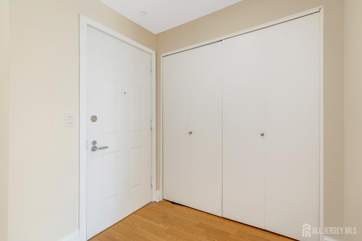 1 Spring Street, Unit 1704 New Brunswick, NJ 08901 - Photo 27 of 44 a view of small space with wooden floor