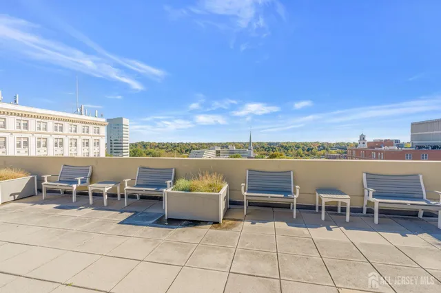 a view of a terrace with furniture and outdoor space