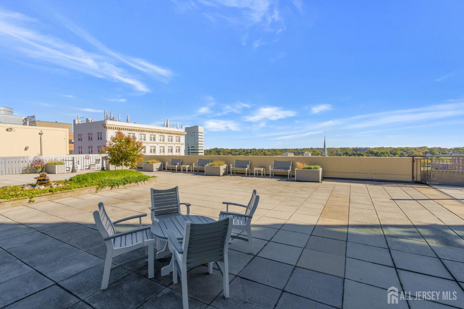 1 Spring Street, Unit 1704 New Brunswick, NJ 08901 - Photo 36 of 44 a view of swimming pool with seating space