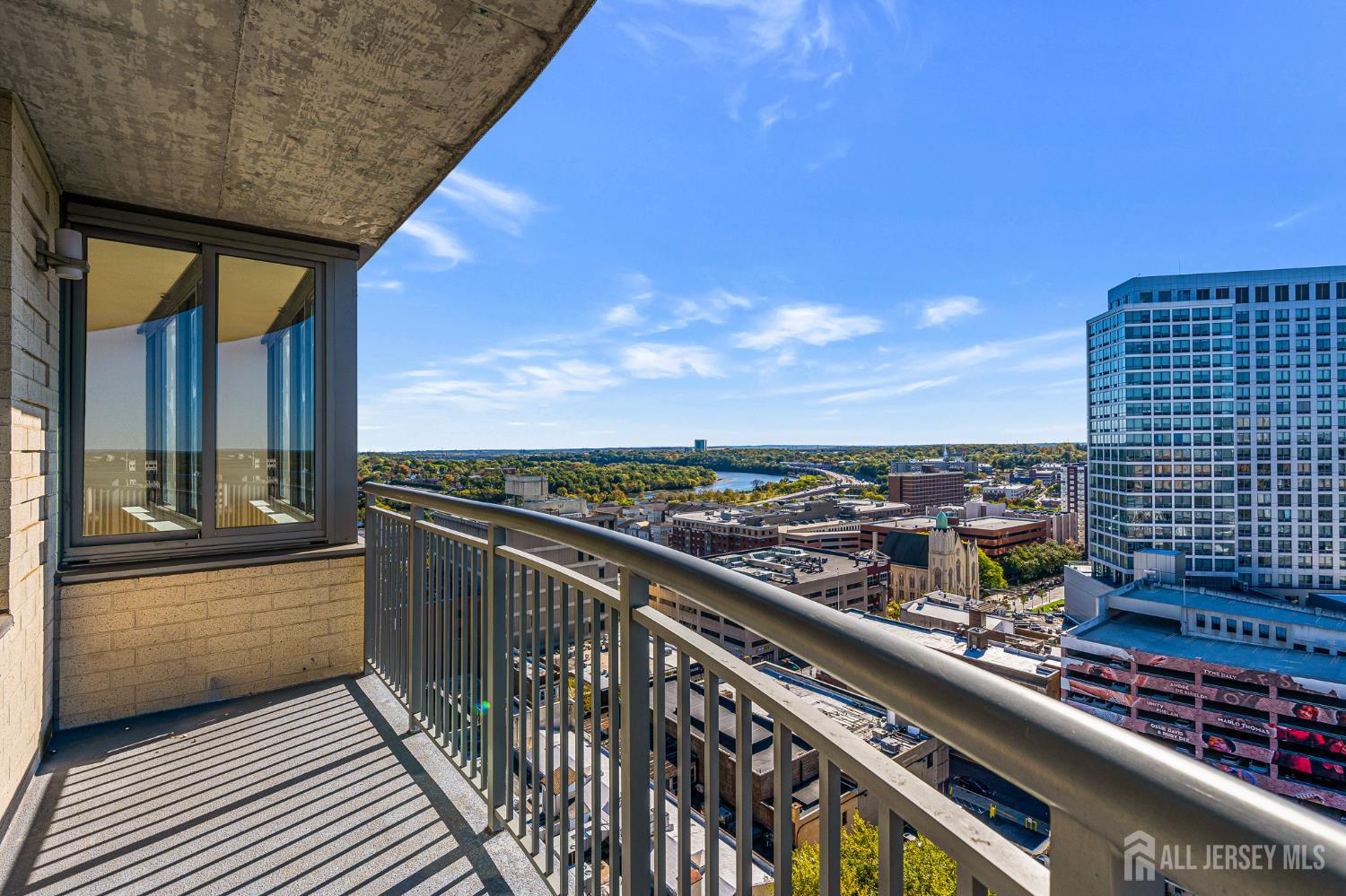 1 Spring Street, Unit 1704 New Brunswick, NJ 08901 - Photo 39 of 44 a view of city from a balcony
