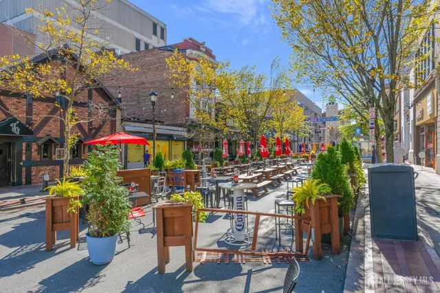 a view of dinning table and chairs in patio