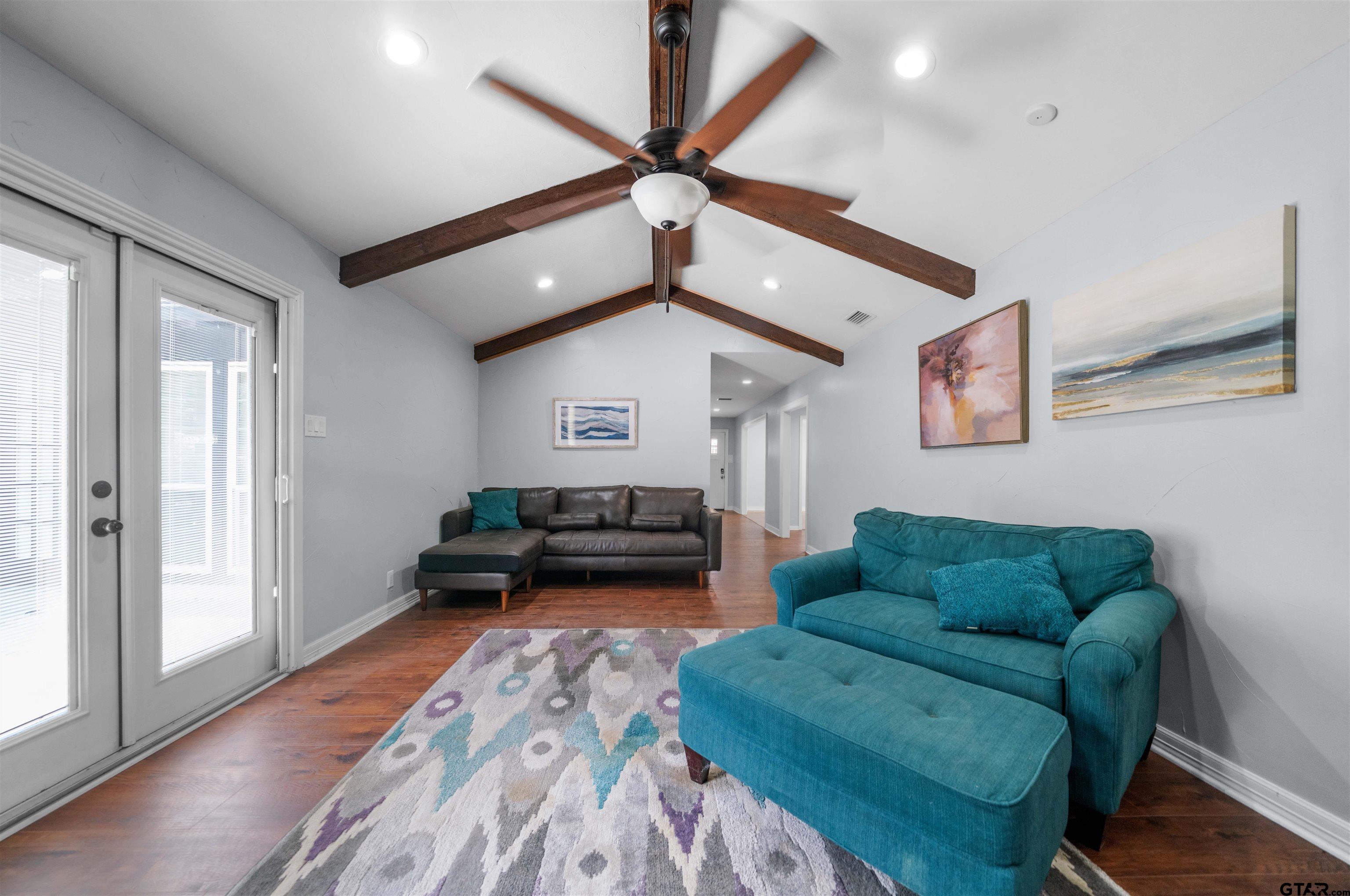 4107 Chester Drive Tyler, TX 75701 - Photo 23 of 45 a living room with furniture and a rug