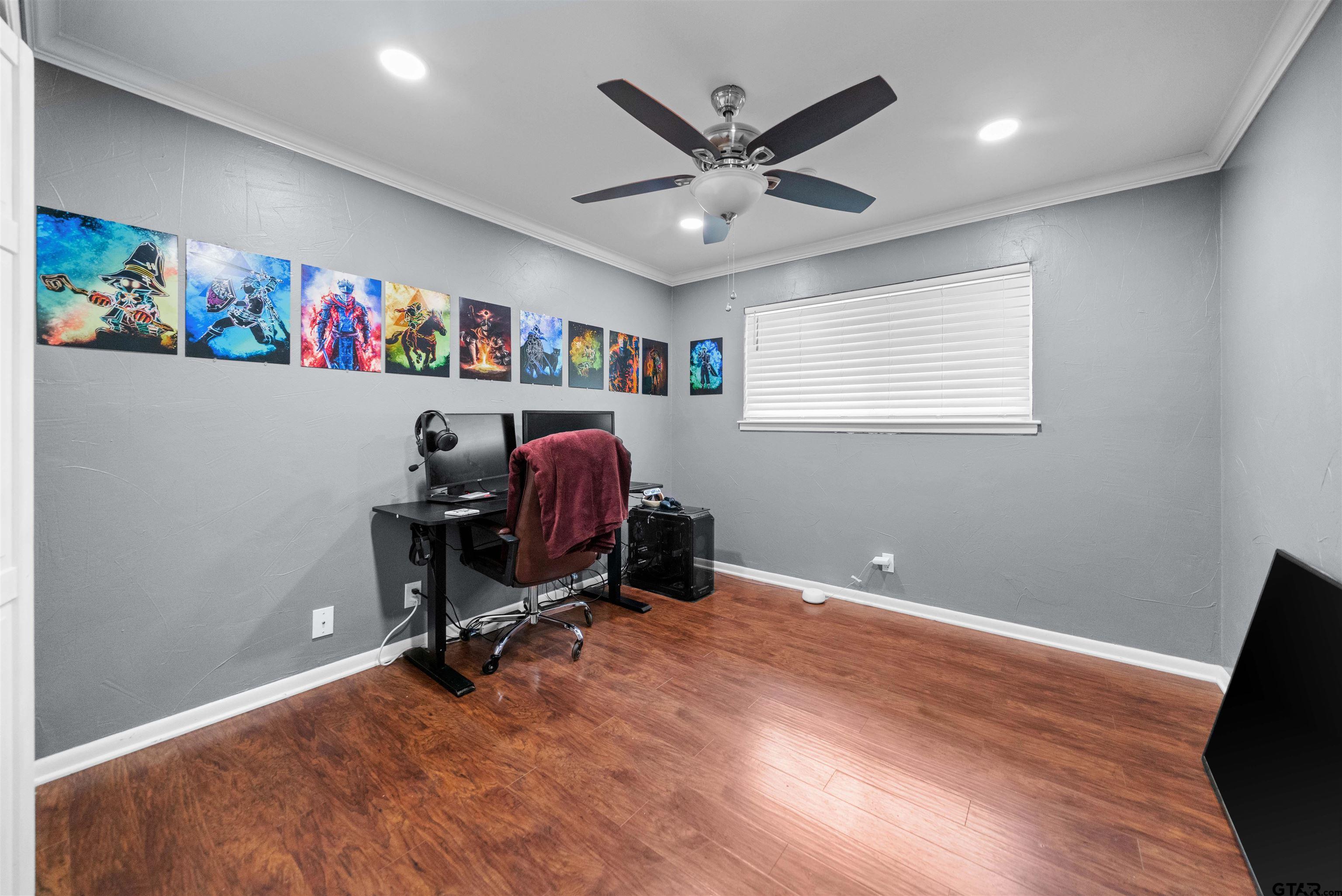 4107 Chester Drive Tyler, TX 75701 - Photo 25 of 45 a view of a workspace with furniture and a window