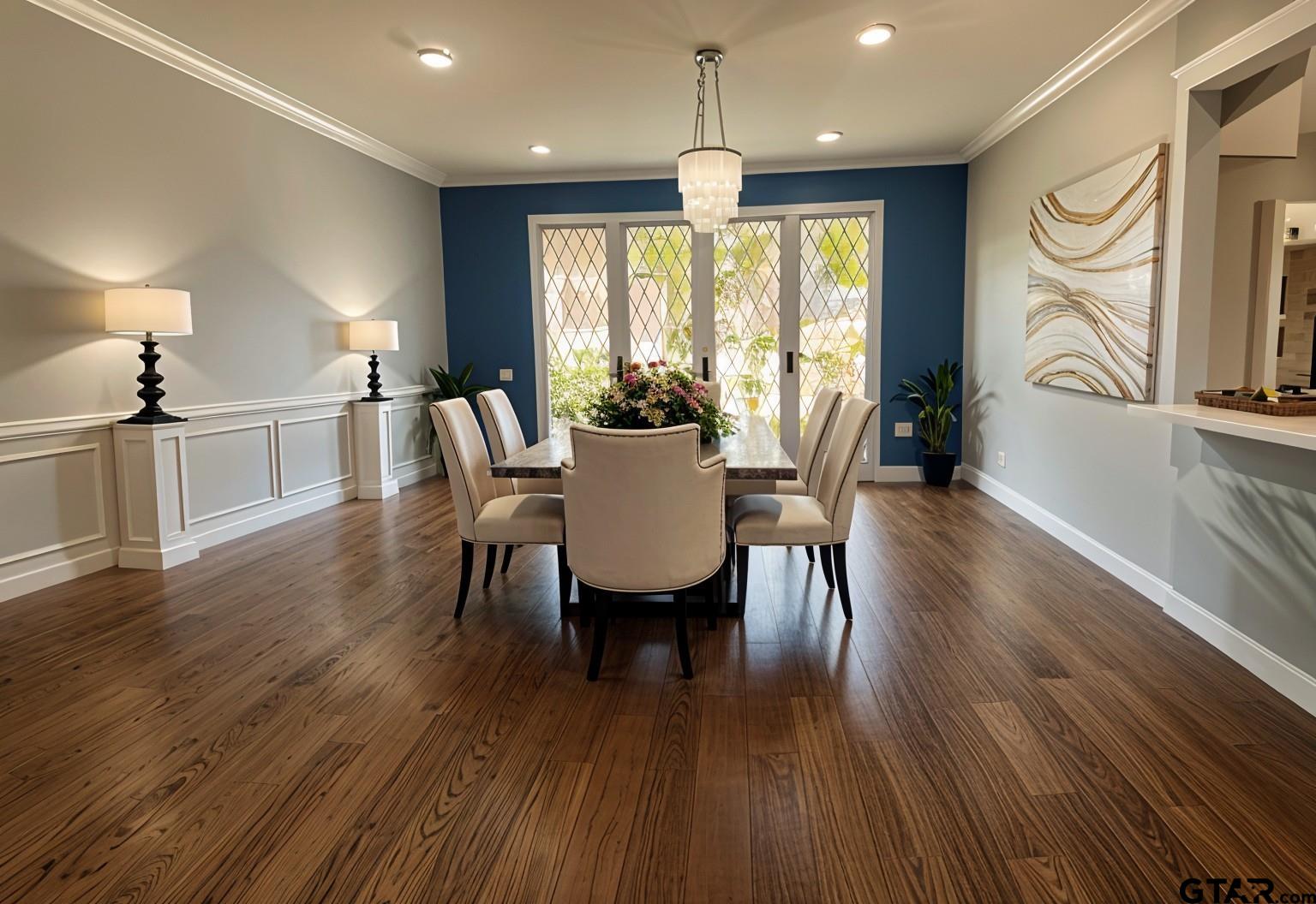 4107 Chester Drive Tyler, TX 75701 - Photo 37 of 45 a view of a dining room with furniture window and wooden floor