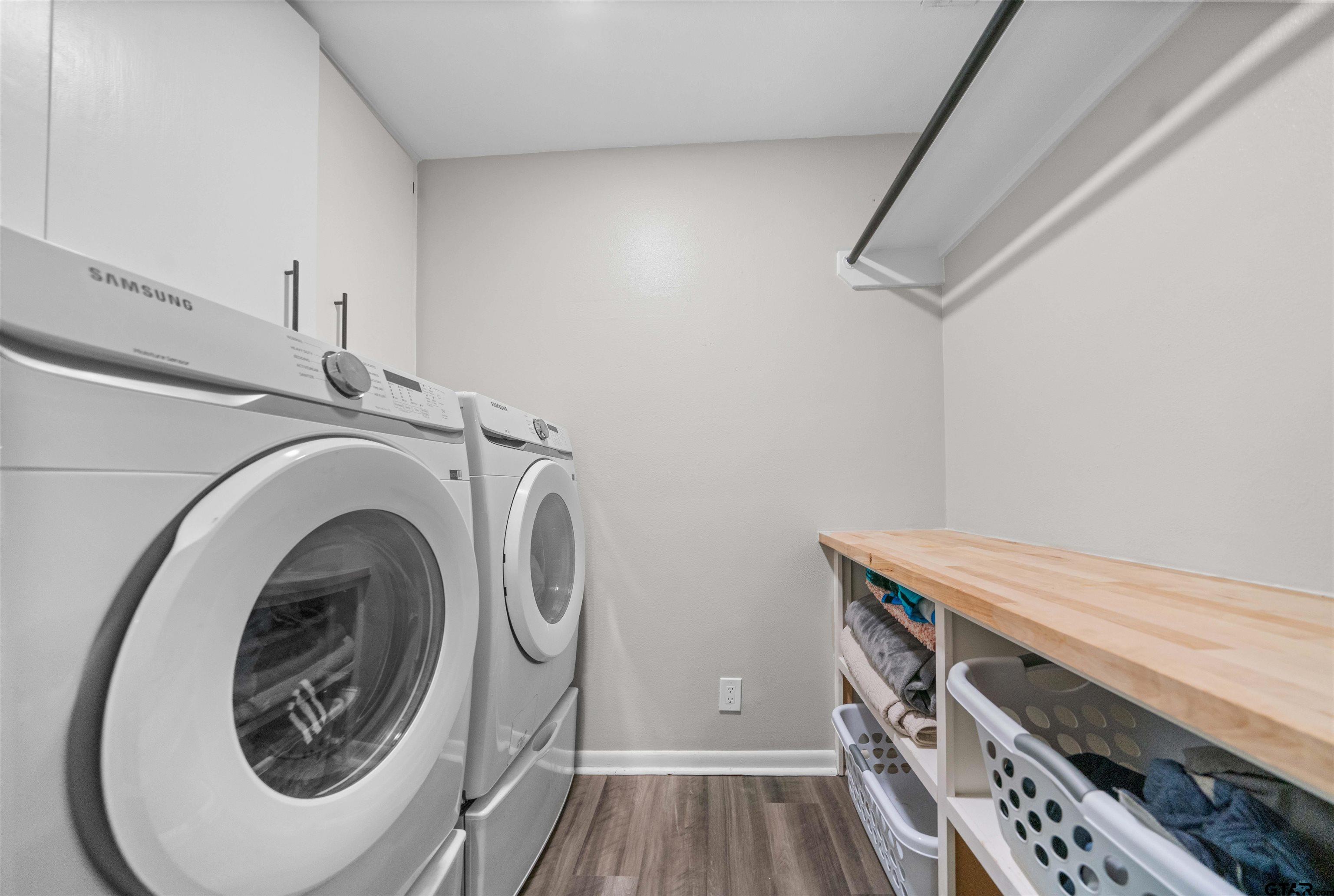 4107 Chester Drive Tyler, TX 75701 - Photo 37 of 45 a utility room with dryer and washer