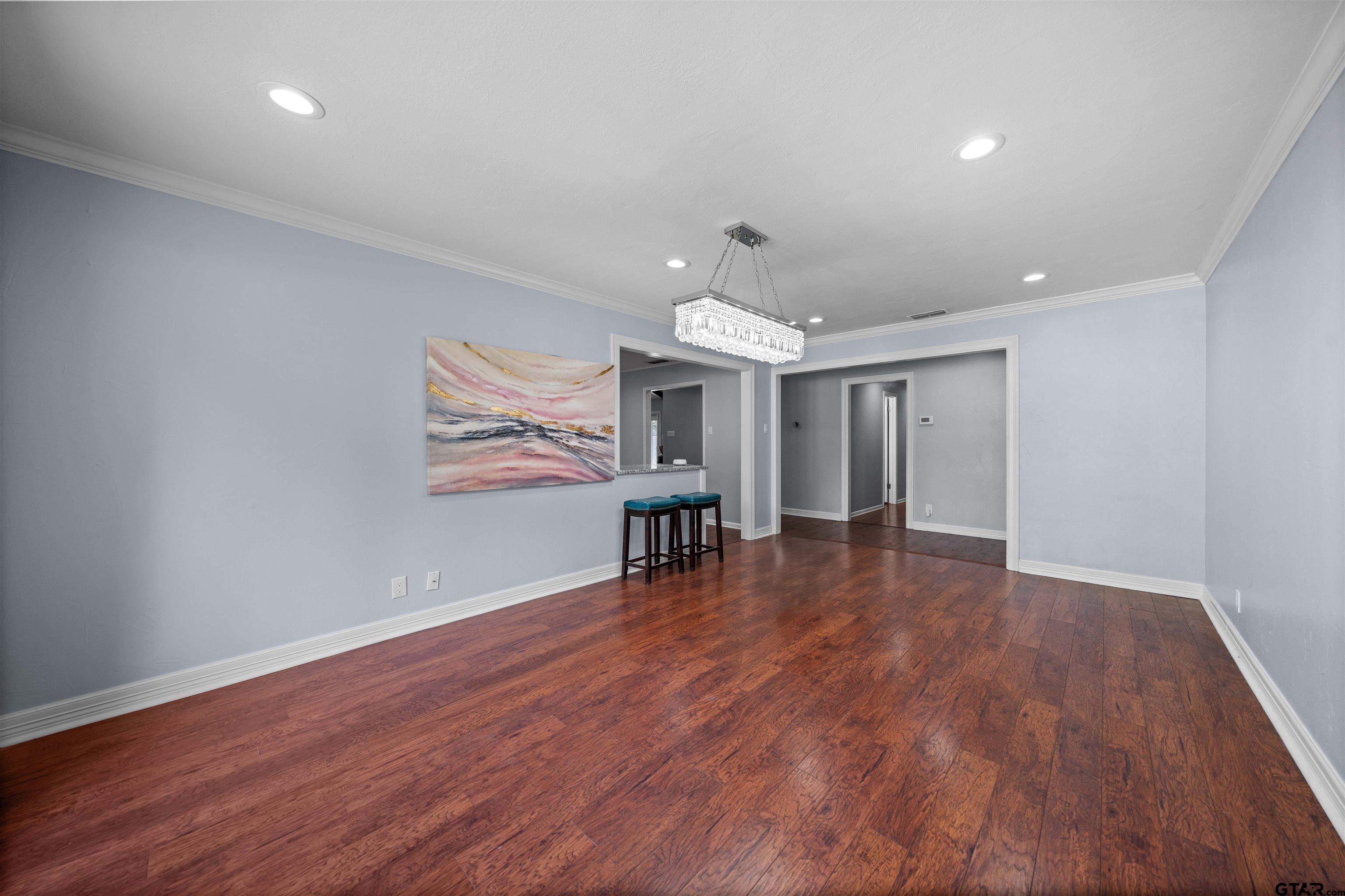 4107 Chester Drive Tyler, TX 75701 - Photo 38 of 45 a view of empty room with wooden floor and fireplace