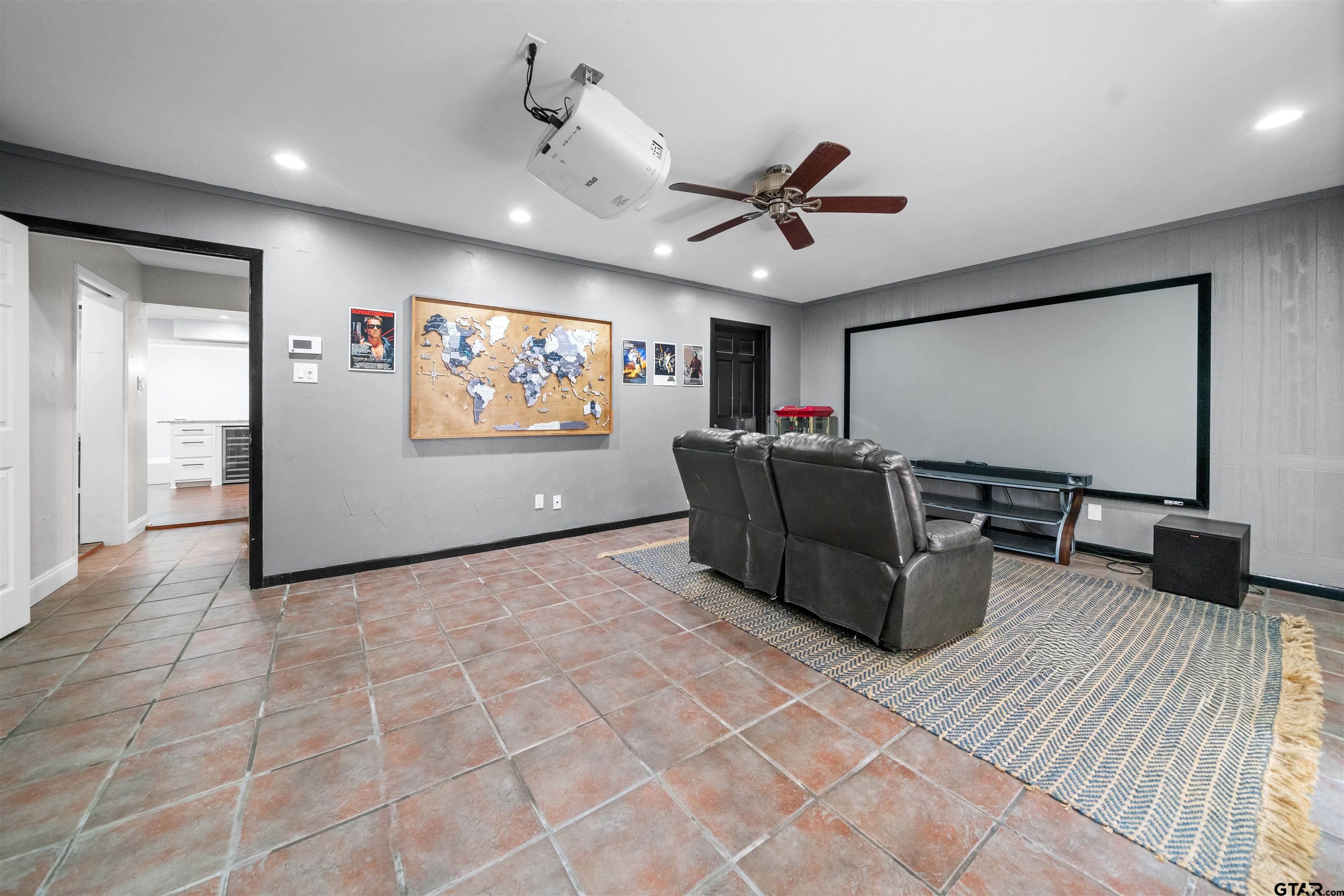 4107 Chester Drive Tyler, TX 75701 - Photo 4 of 45 a living room with furniture and a flat screen tv