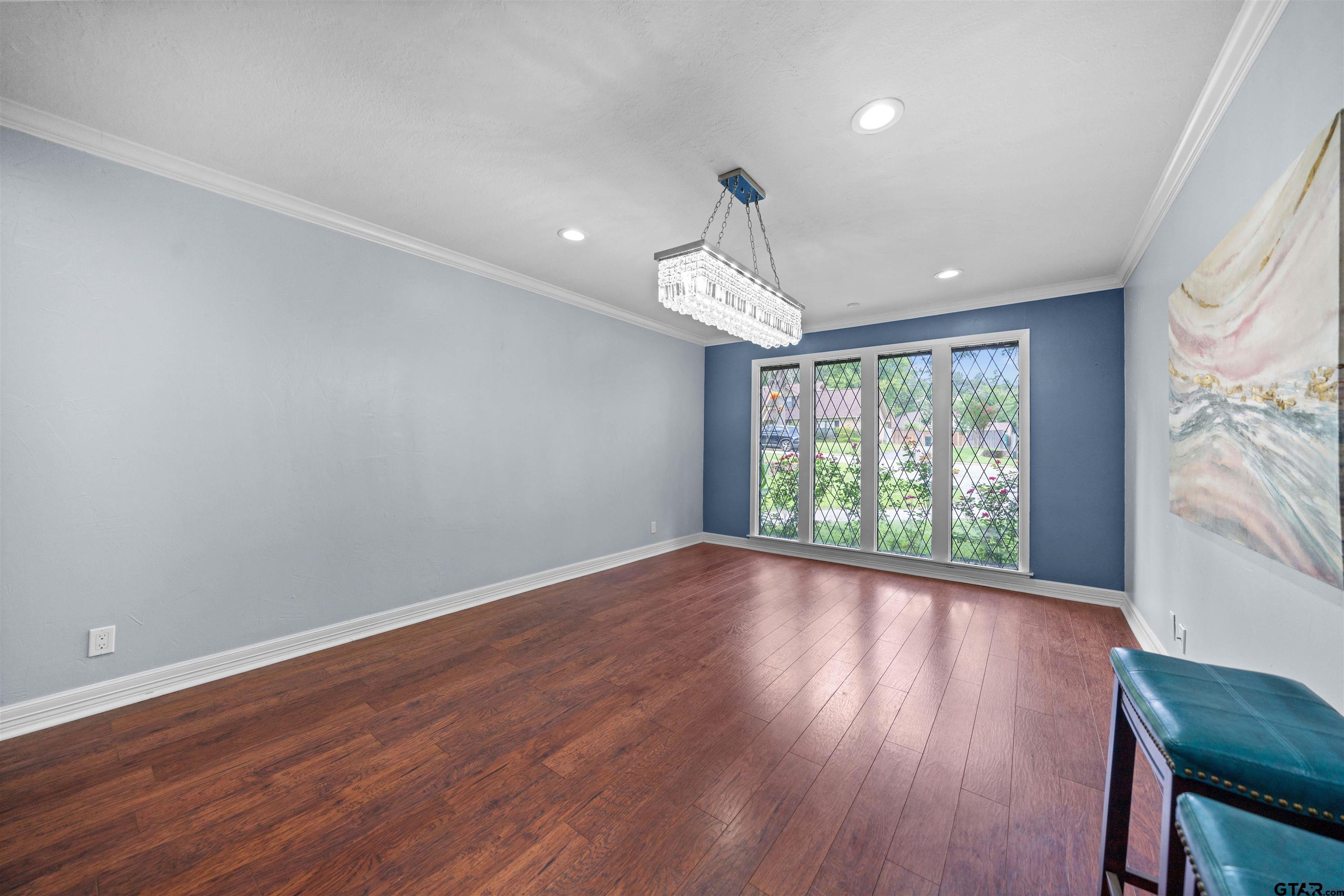 4107 Chester Drive Tyler, TX 75701 - Photo 6 of 45 wooden floor in an empty room with a window