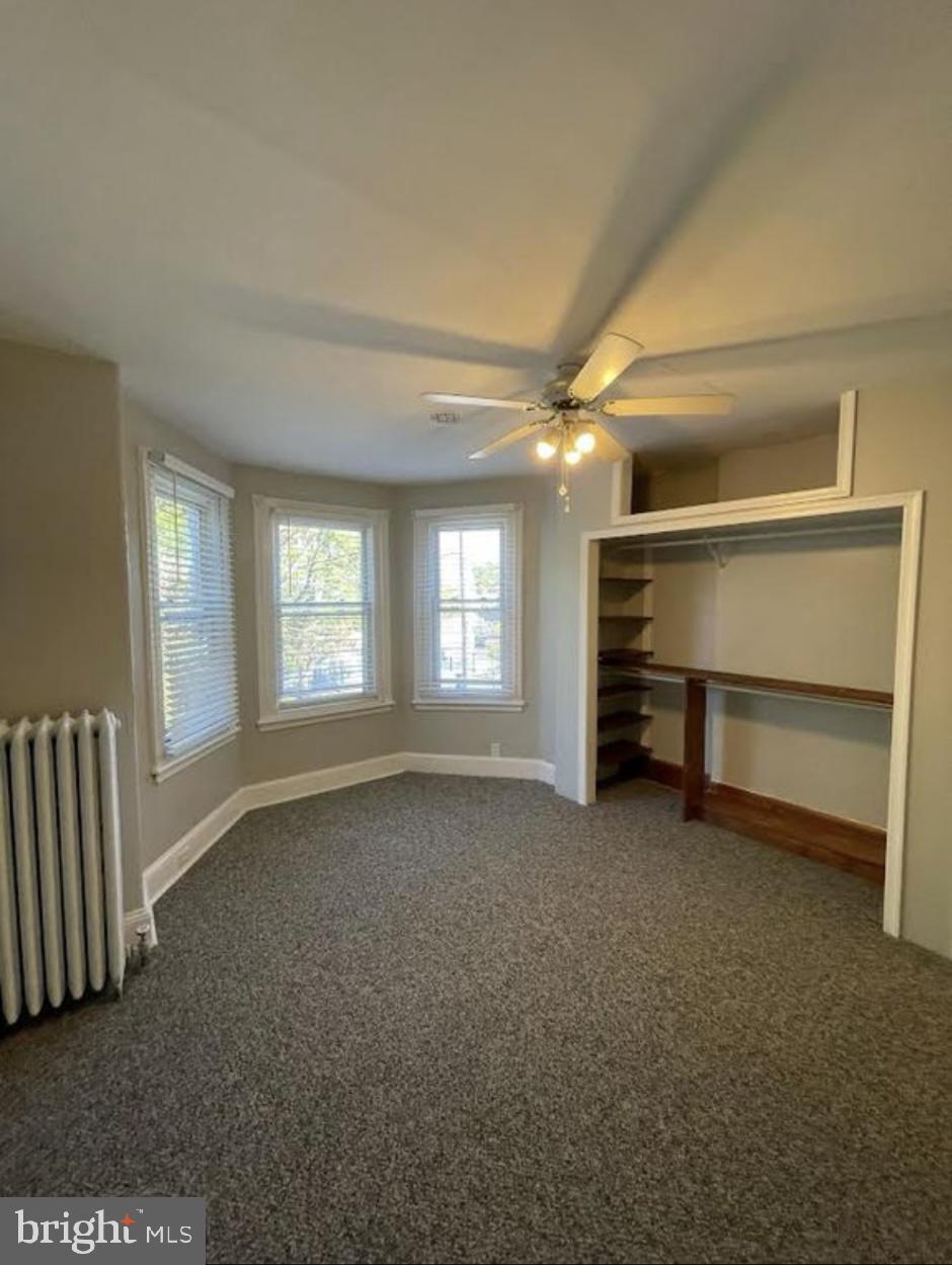 5616 Christian Street Philadelphia, PA 19143 - Photo 10 of 12 a view of an empty room with a window