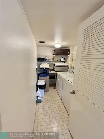 a kitchen with stainless steel appliances a stove top oven