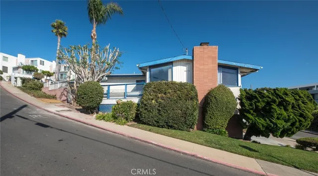 a house view with a garden space