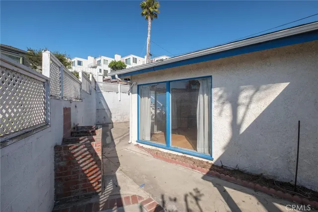 a view of a balcony with chairs