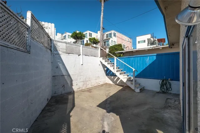 a view of balcony with furniture