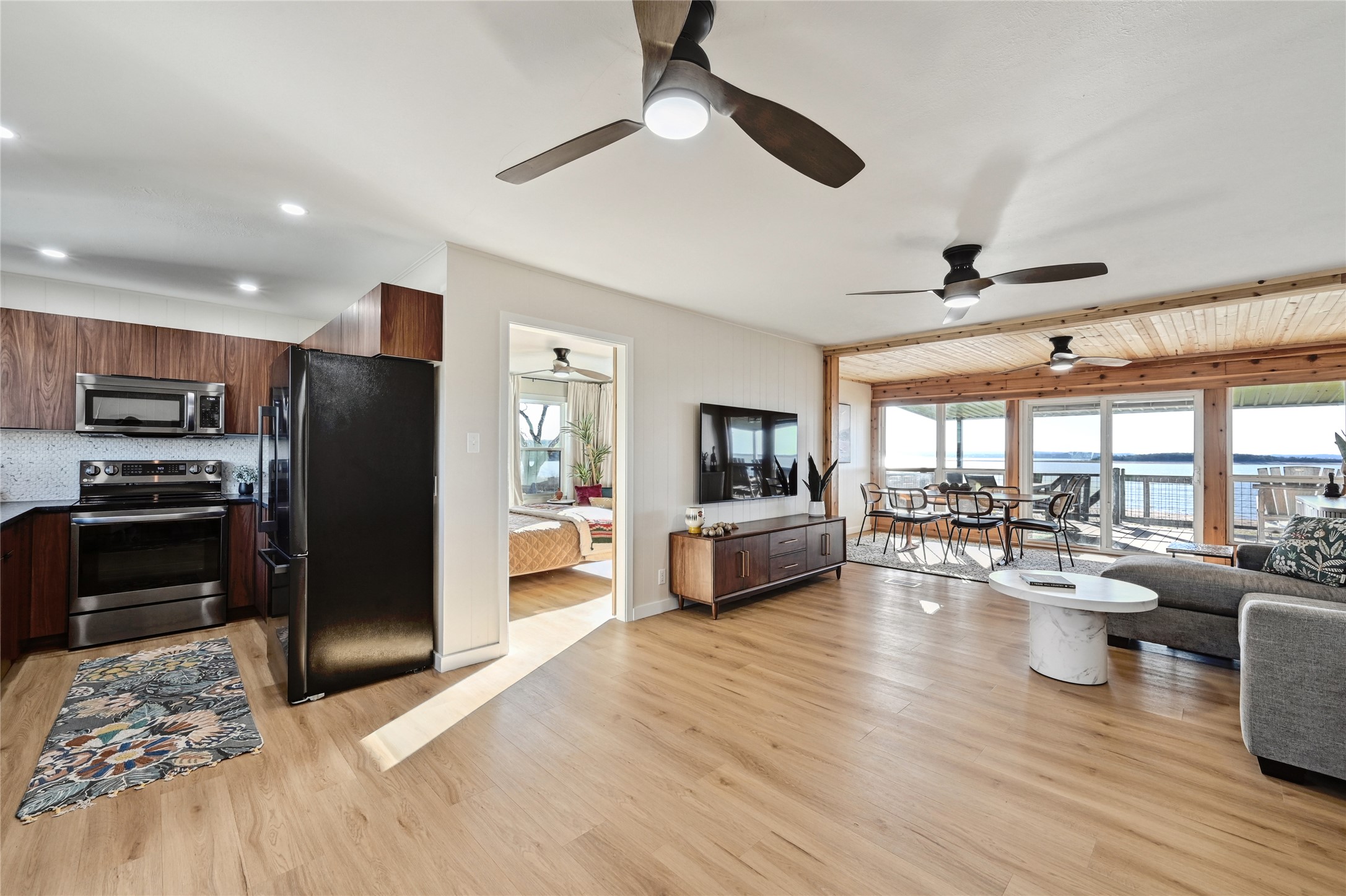 611 Lakeshore Loop Tow, TX 78672 - Photo 5 of 40 Living area with plenty of natural light, light wood-style floors, and recessed lighting