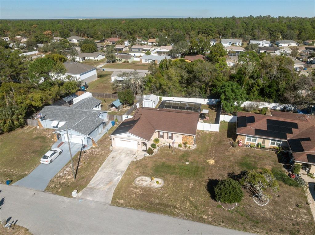12265 Shafton Road Spring Hill, FL 34608 - Photo 30 of 51 an aerial view of a house with a yard