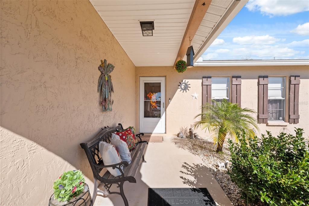 12265 Shafton Road Spring Hill, FL 34608 - Photo 3 of 51 a view of a chairs and table in patio