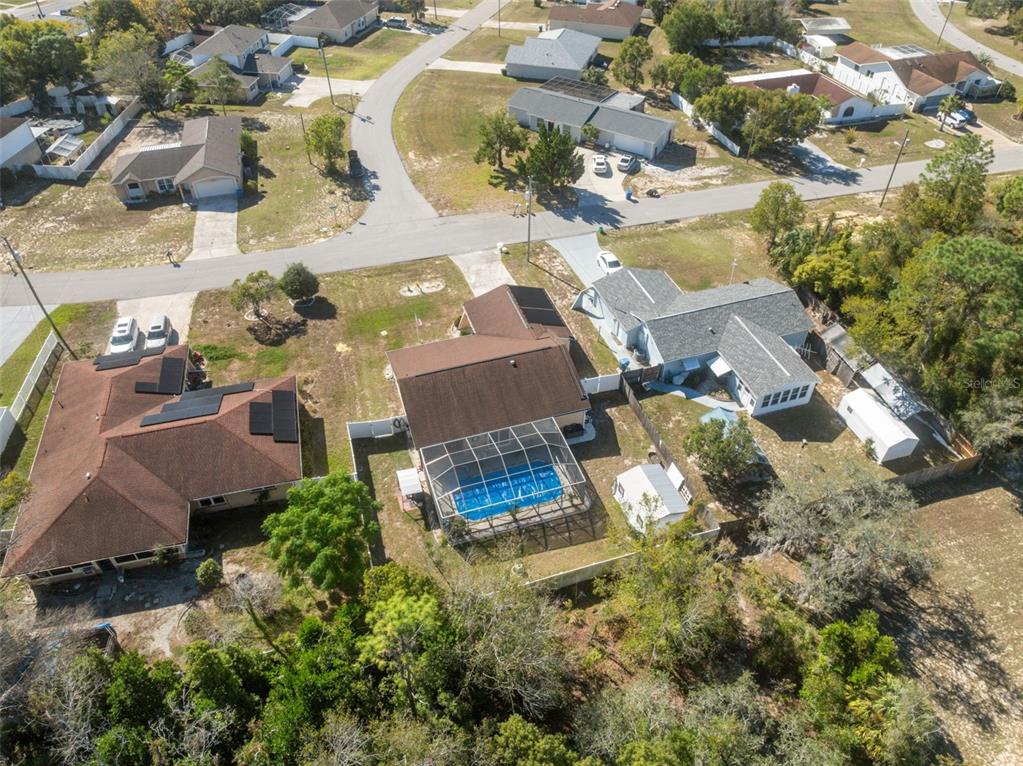 12265 Shafton Road Spring Hill, FL 34608 - Photo 32 of 51 an aerial view of multiple houses with yard