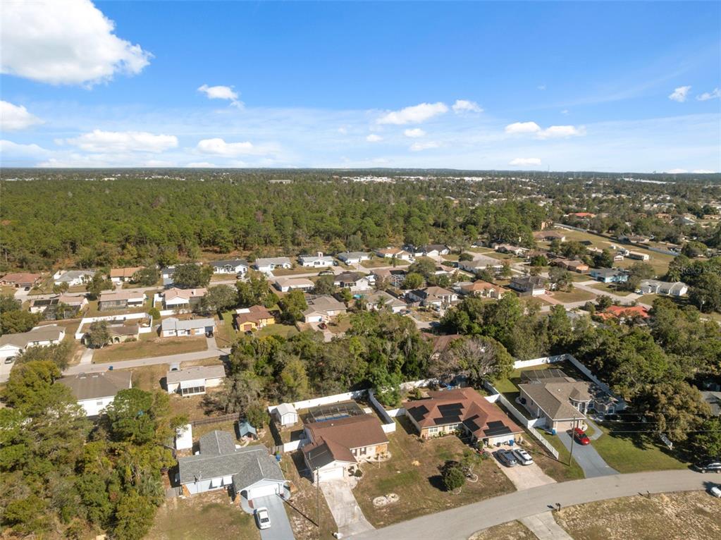 12265 Shafton Road Spring Hill, FL 34608 - Photo 41 of 51 an aerial view of residential houses with outdoor space and ocean view