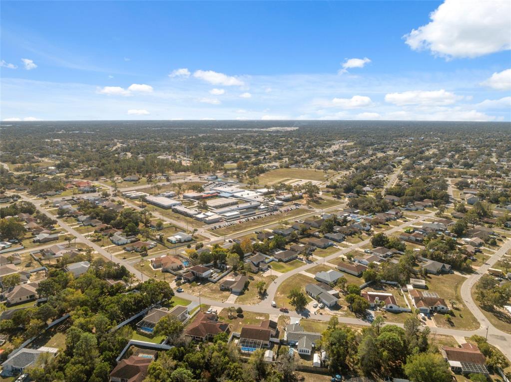 12265 Shafton Road Spring Hill, FL 34608 - Photo 43 of 58 an aerial view of residential building and green space