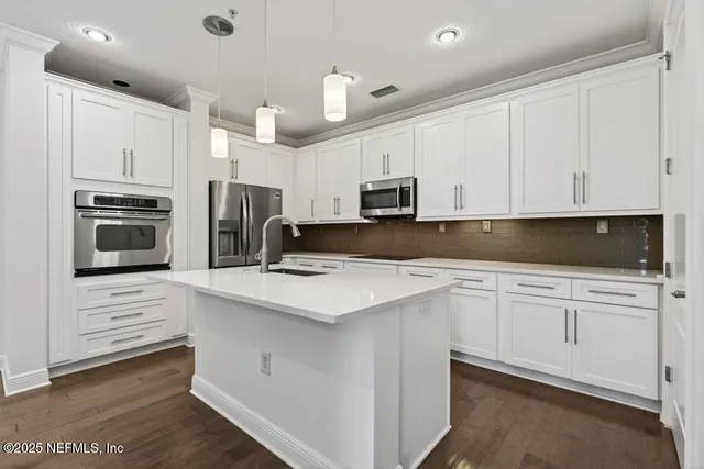 a view of a dining room with furniture